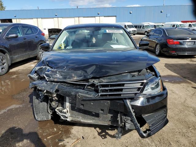 Photo 5 from auction – 2017 VOLKSWAGEN JETTA S with VIN 3VW2B7AJ5HM204706
