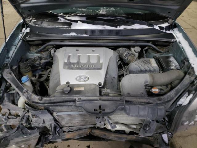 Photo 12 from auction – 2005 HYUNDAI TUCSON GL with VIN KM8JM72D95U173318