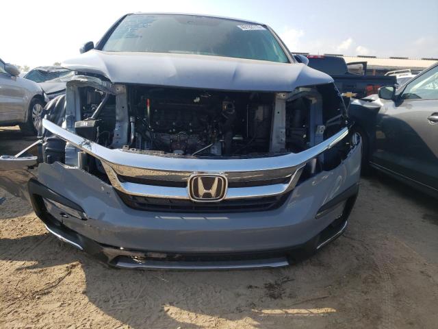 Photo 5 from auction – 2022 HONDA PILOT TOUR with VIN 5FNYF5H66NB021709