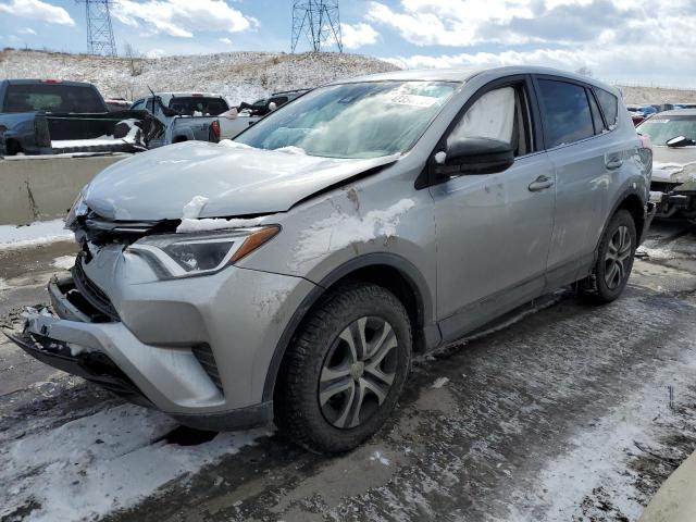 TOYOTA RAV4 LE 2018 with VIN 2T3BFREV8JW715802 - Photo from auction