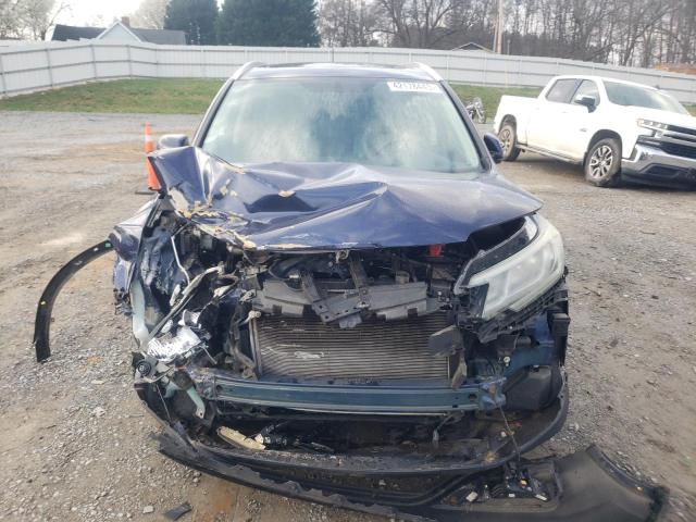 Photo 5 from auction – 2015 HONDA CR-V with VIN 2HKRM4H78FH653076