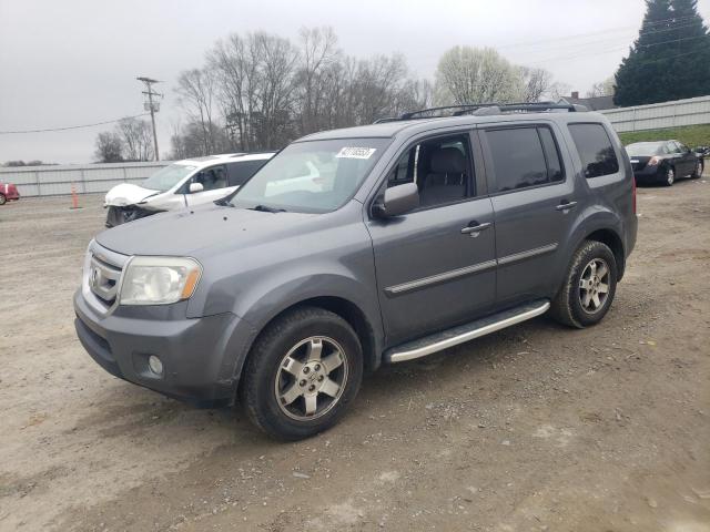 HONDA PILOT TOUR 2011 with VIN 5FNYF3H97BB056673 - Photo from auction