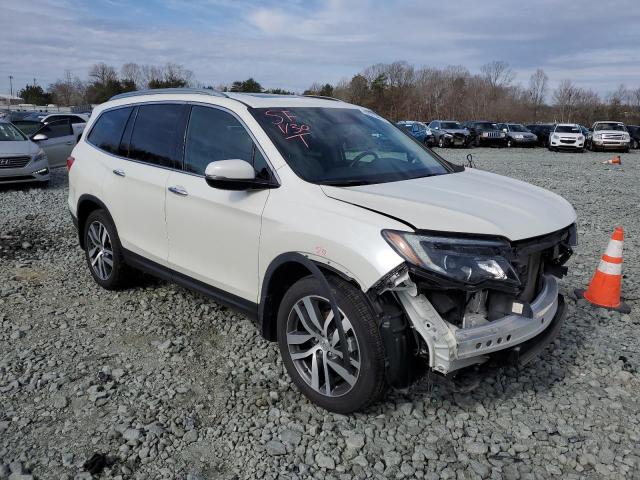 Photo 4 from auction – 2016 HONDA PILOT ELIT with VIN 5FNYF6H01GB119373