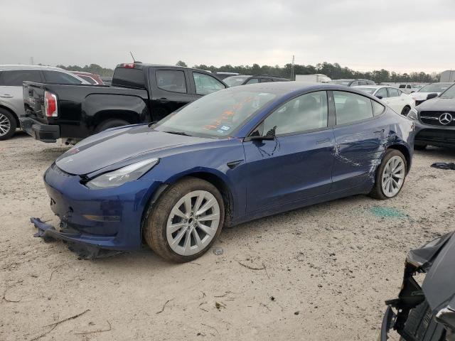 TESLA MODEL 3 2022 with VIN 5YJ3E1EA2NF287372 - Photo from auction