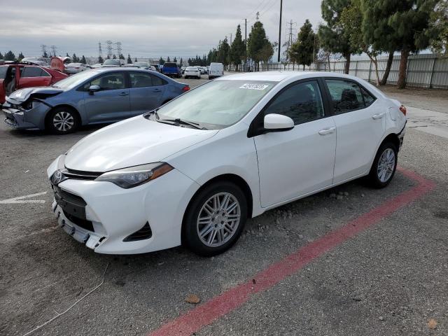 TOYOTA COROLLA L 2018 with VIN 5YFBURHE2JP803126 - Photo from auction