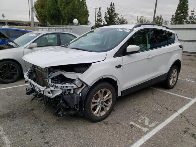 FORD ESCAPE SE 2018 with VIN 1FMCU0GD8JUD07867 - Photo from auction