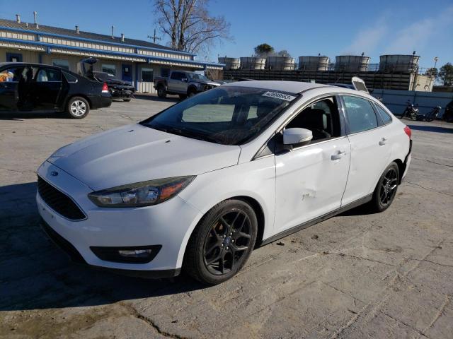 FORD FOCUS SE 2016 with VIN 1FADP3F2XGL325745 - Photo from auction