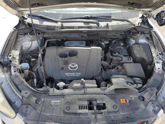 Photo 11 from auction – 2015 MAZDA CX-5 GT with VIN JM3KE2DY0F0497203