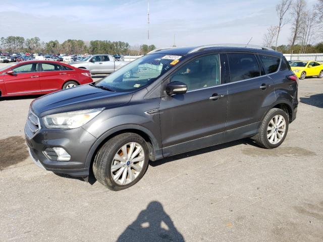 FORD ESCAPE TIT 2017 with VIN 1FMCU0J94HUE76749 - Photo from auction