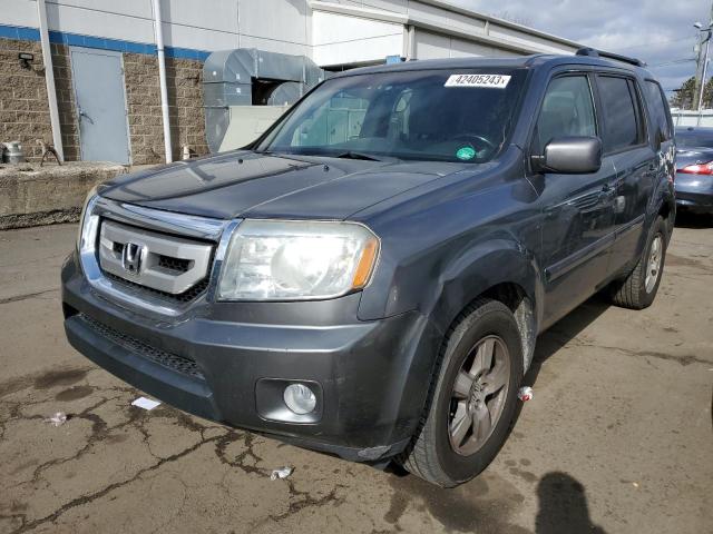 HONDA PILOT EXLN 2011 with VIN 5FNYF4H74BB003692 - Photo from auction