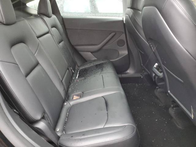 Photo 11 from auction – 2022 TESLA MODEL Y with VIN 7SAYGDEF0NF381783