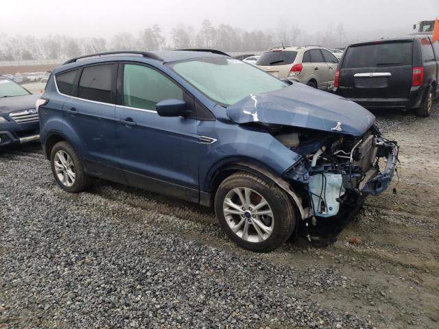 Photo 4 from auction – 2018 FORD ESCAPE SE with VIN 1FMCU9GD0JUC00610