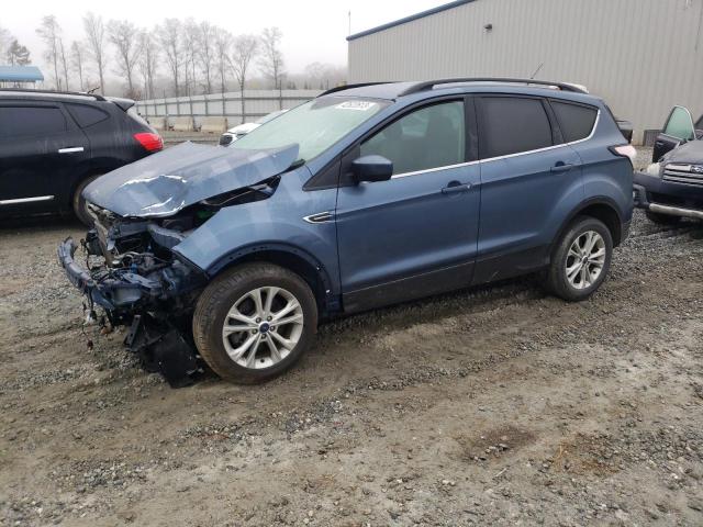 FORD ESCAPE SE 2018 with VIN 1FMCU9GD0JUC00610 - Photo from auction