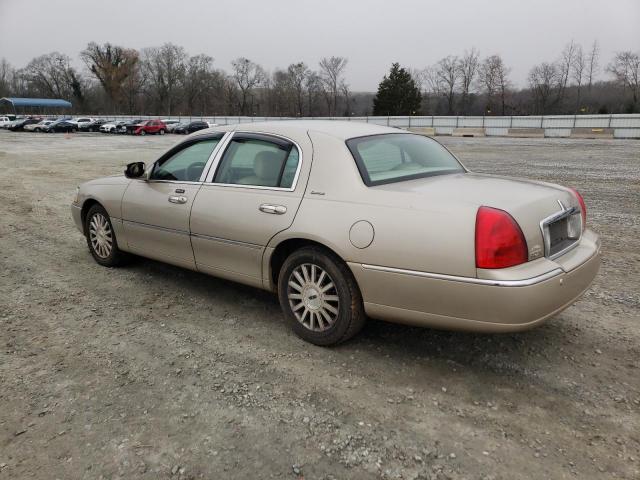 Photo 2 from auction – 2004 LINCOLN TOWN CAR E with VIN 1LNHM81W94Y666317