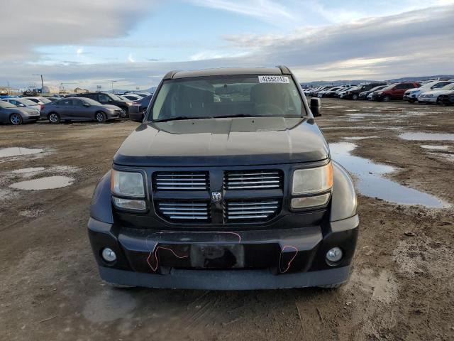 Photo 5 from auction – 2011 DODGE NITRO HEAT with VIN 1D4PT4GX1BW556482