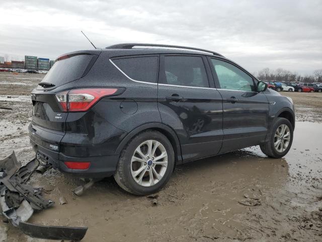 Photo 3 from auction – 2017 FORD ESCAPE SE with VIN 1FMCU9G95HUC76135
