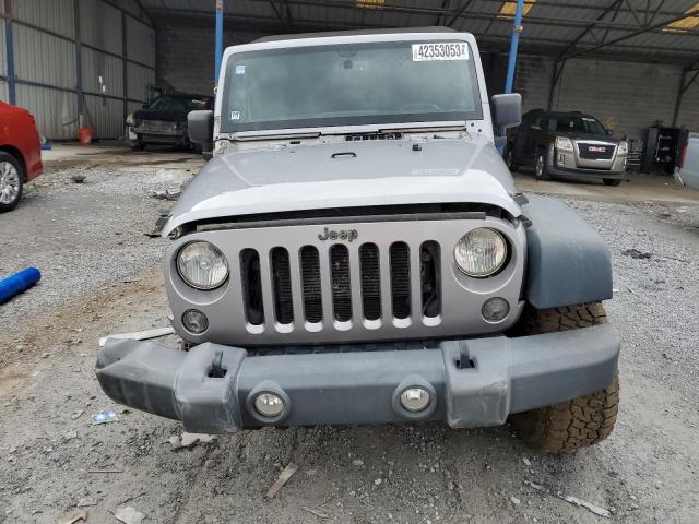 Photo 5 from auction – 2014 JEEP WRANGLER U with VIN 1C4BJWFG3EL115016