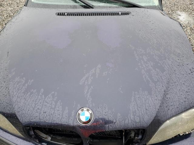 Photo 11 from auction – 2005 BMW 325 IS SUL with VIN WBAAZ33475KW78067