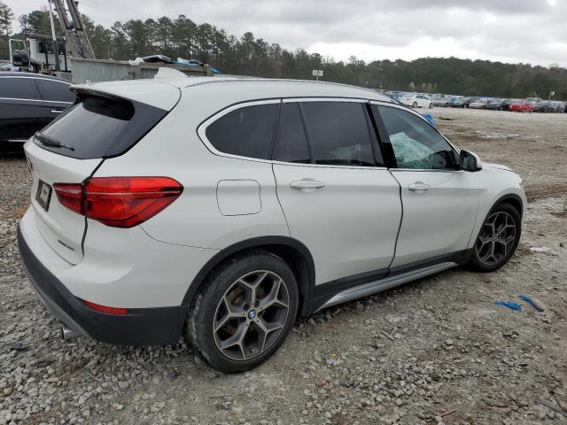 Photo 3 from auction – 2019 BMW X1 SDRIVE2 with VIN WBXHU7C58K5N48652
