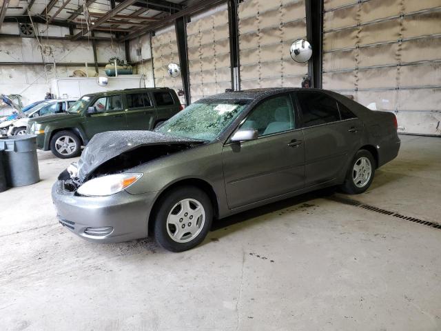 TOYOTA CAMRY LE 2002 with VIN JTDBE30K520034886 - Photo from auction