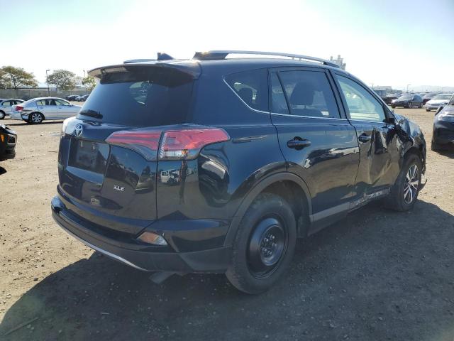 Photo 3 from auction – 2017 TOYOTA RAV4 XLE with VIN JTMWFREV0HJ714511