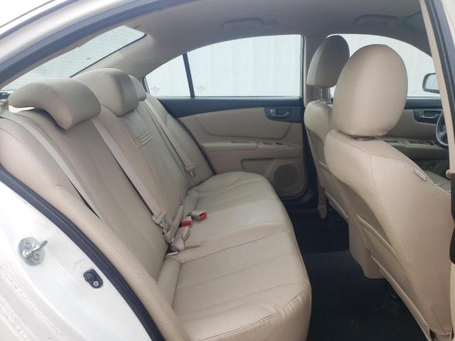 Photo 10 from auction – 2009 KIA OPTIMA LX with VIN KNAGE228795290958