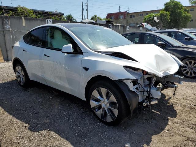 Photo 4 from auction – 2023 TESLA MODEL Y with VIN 7SAYGDEE0PF613227