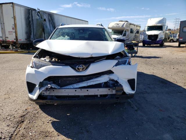 Photo 5 from auction – 2017 TOYOTA RAV4 LE with VIN JTMZFREV8HJ701518