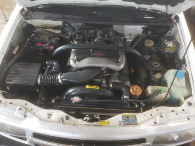 Photo 12 from auction – 2003 CHEVROLET TRACKER ZR with VIN 2CNBJ734X36931397