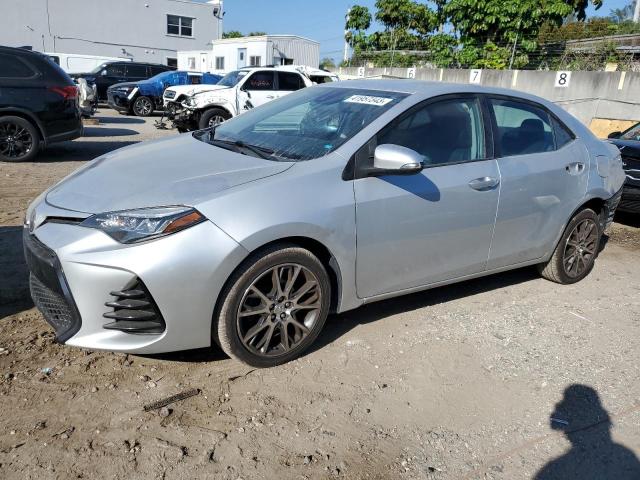 TOYOTA COROLLA L 2017 with VIN 5YFBURHE7HP622002 - Photo from auction
