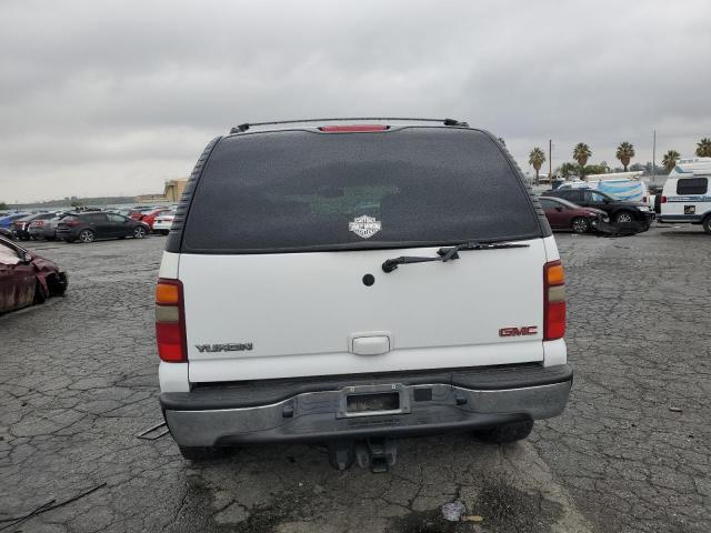 Photo 6 from auction – 2003 GMC YUKON with VIN 1GKEC13VX3R253356