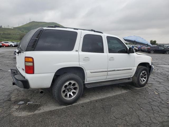 Photo 3 from auction – 2003 GMC YUKON with VIN 1GKEC13VX3R253356