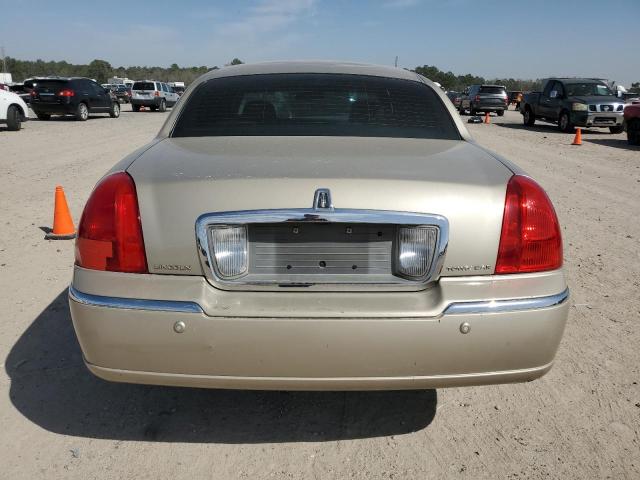 Photo 6 from auction – 2004 LINCOLN TOWN CAR E with VIN 1LNHM81W44Y679847