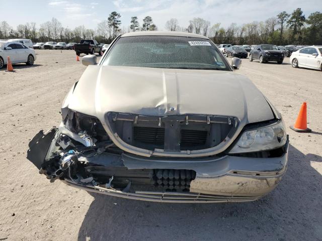 Photo 5 from auction – 2004 LINCOLN TOWN CAR E with VIN 1LNHM81W44Y679847