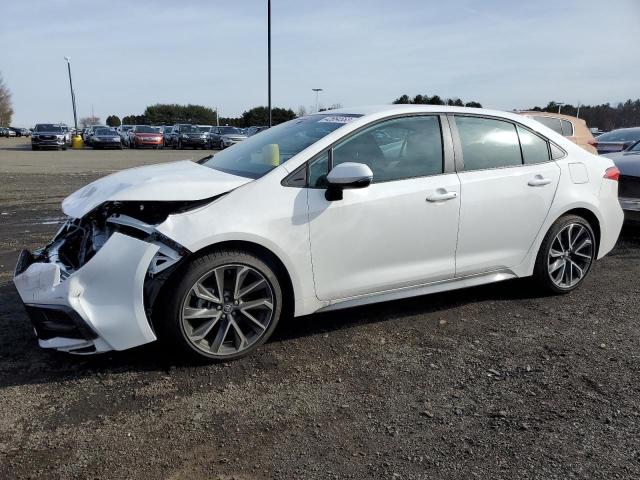 TOYOTA COROLLA SE 2022 with VIN 5YFS4MCE8NP130309 - Photo from auction