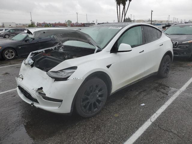 TESLA MODEL Y 2022 with VIN 7SAYGDEE0NF324460 - Photo from auction