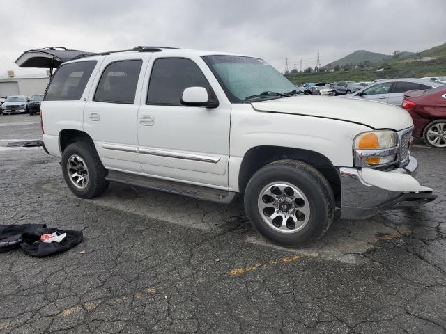 Photo 4 from auction – 2003 GMC YUKON with VIN 1GKEC13VX3R253356