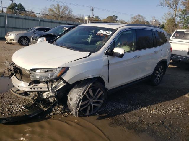 HONDA PILOT TOUR 2017 with VIN 5FNYF5H90HB003673 - Photo from auction
