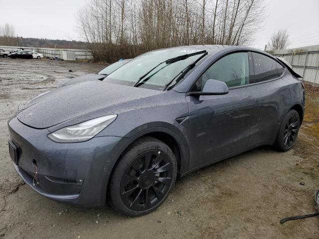 TESLA MODEL Y 2022 with VIN 7SAYGDEE3NF386564 - Photo from auction