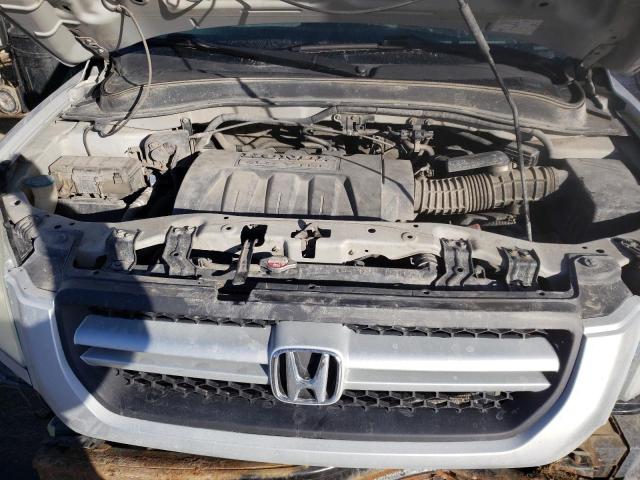 Photo 12 from auction – 2005 HONDA PILOT EX with VIN 2HKYF18435H513025