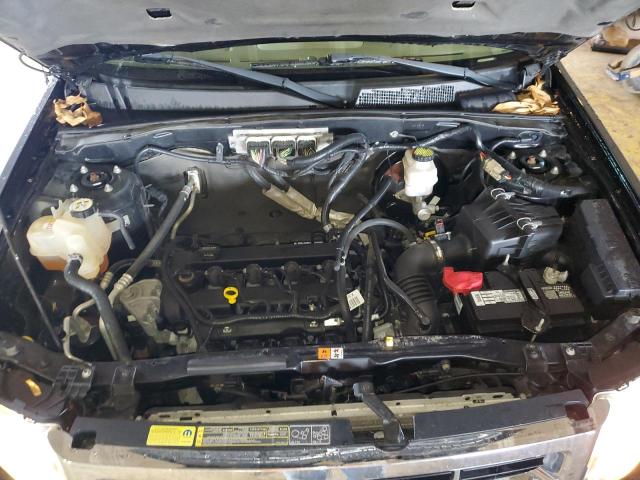 Photo 11 from auction – 2011 FORD ESCAPE LIM with VIN 1FMCU0E77BKA73778