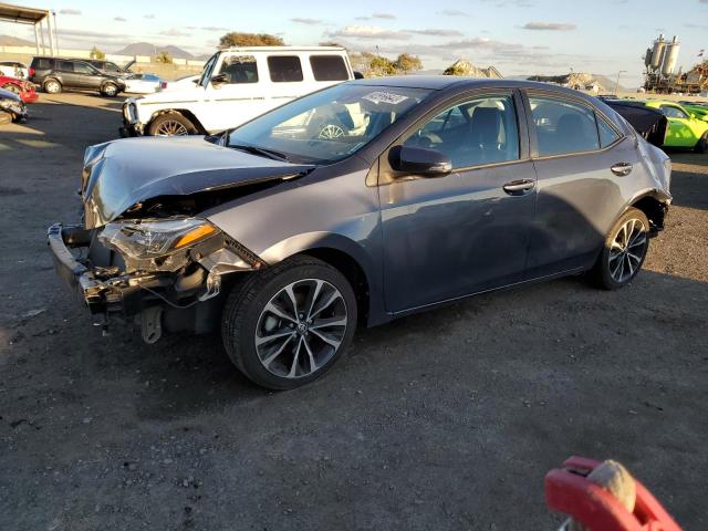 TOYOTA COROLLA L 2018 with VIN 5YFBURHE8JP778930 - Photo from auction