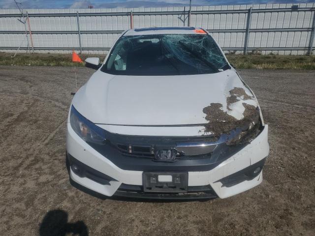 Photo 5 from auction – 2017 HONDA CIVIC EXL with VIN 2HGFC1F76HH655333