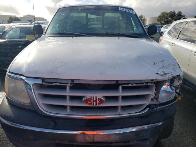 Photo 11 from auction – 1999 FORD F150 with VIN 1FTRF18W7XKA23813