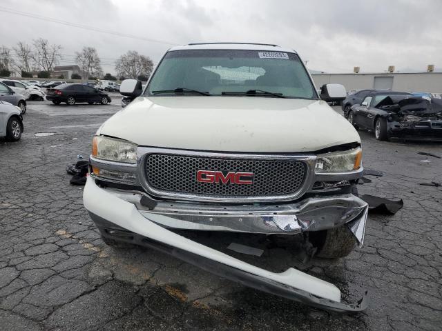 Photo 5 from auction – 2003 GMC YUKON with VIN 1GKEC13VX3R253356