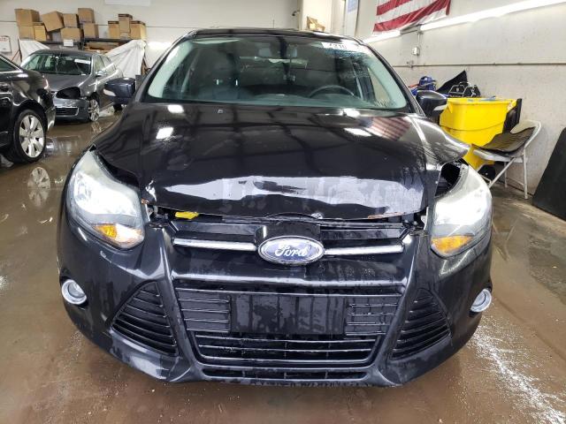Photo 5 from auction – 2012 FORD FOCUS TITA with VIN 1FAHP3N23CL402856
