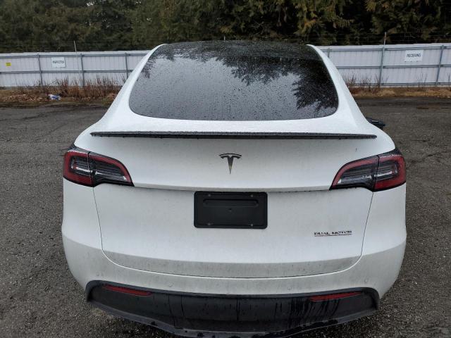 Photo 6 from auction – 2022 TESLA MODEL Y with VIN 7SAYGDEF9NF536721