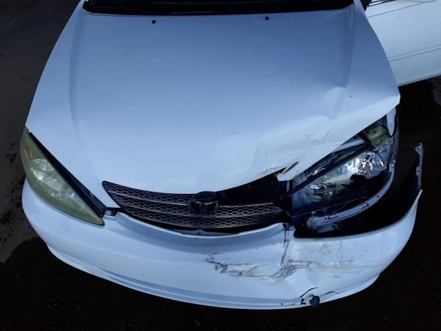 Photo 11 from auction – 2004 TOYOTA CAMRY LE with VIN 4T1BE32KX4U267215