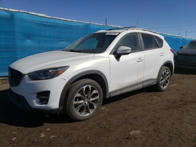 MAZDA CX-5 GT 2016 with VIN JM3KE4DY8G0669877 - Photo from auction