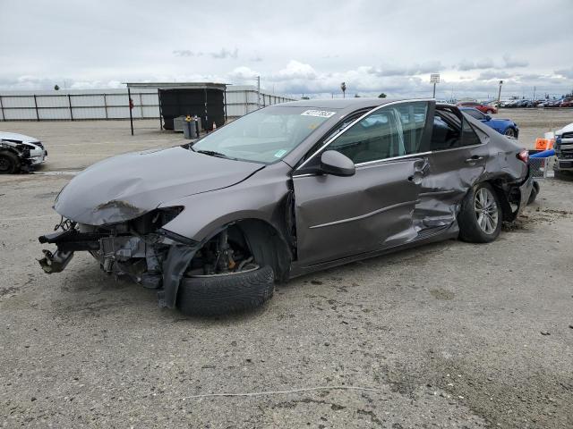 TOYOTA CAMRY LE 2016 with VIN 4T1BF1FK6GU158296 - Photo from auction